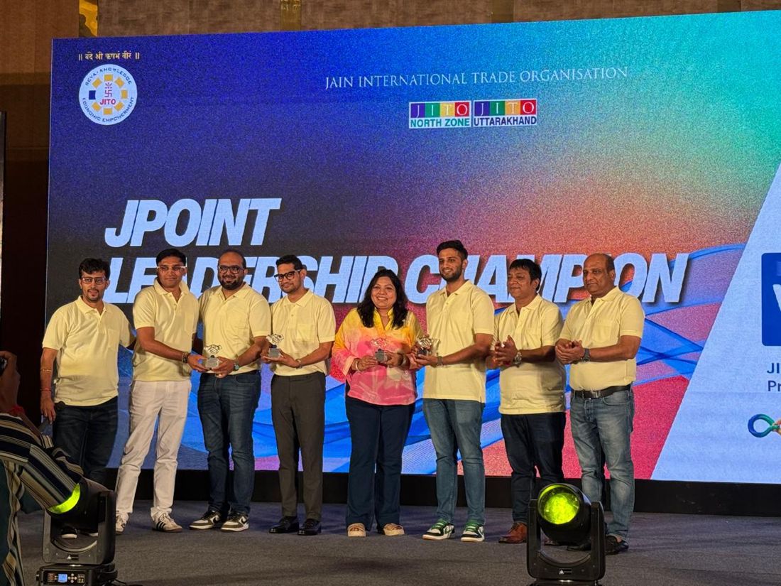 JPoint Leadership Champion, with the JPoint team